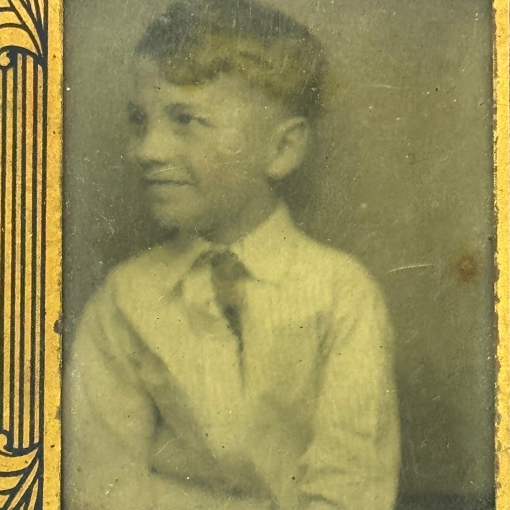 Antique Metal Framed Tintype Photo Of Young Boy In Suit Ornate Gold Border 2.5"