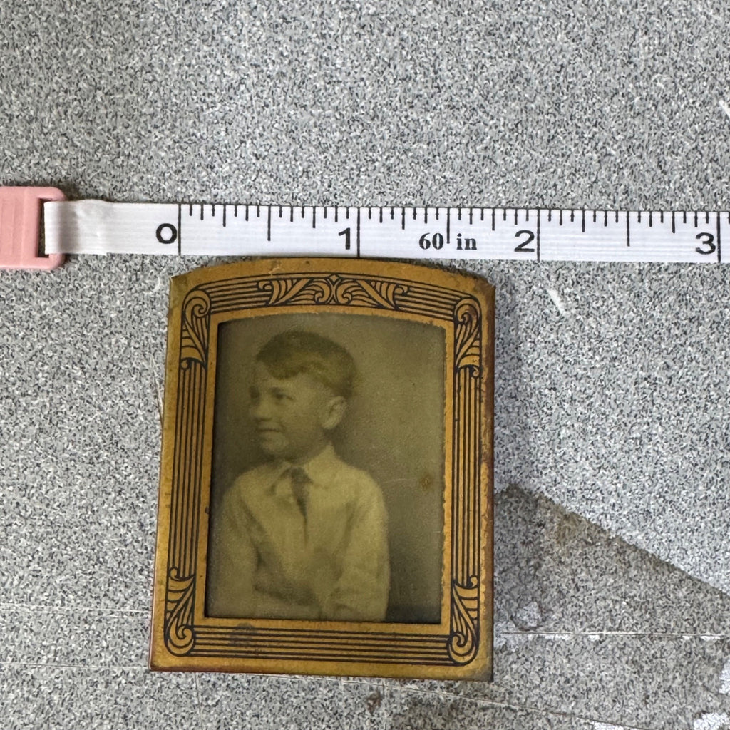 Antique Metal Framed Tintype Photo Of Young Boy In Suit Ornate Gold Border 2.5"
