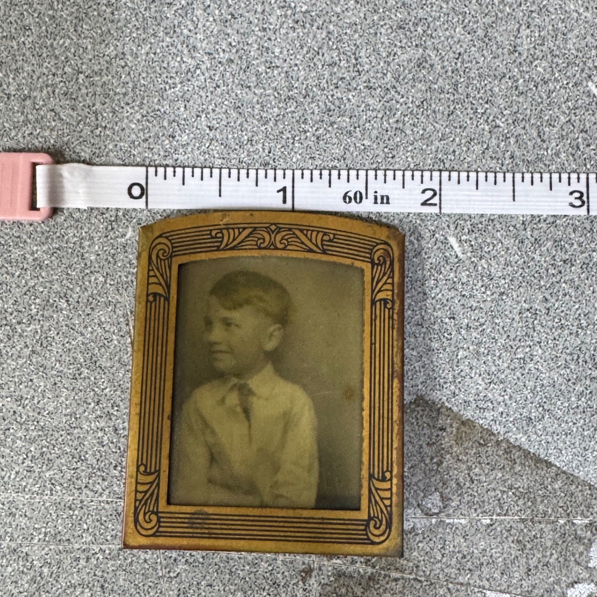 Antique Metal Framed Tintype Photo Of Young Boy In Suit Ornate Gold Border 2.5"